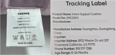 "CPZZKQ" and "Model No: UMCDB01" are printed on stacked labels sewn on the side of the baby lounger