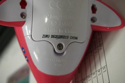 Date code in "DGYYYY/MM/DD" format and in the date code range of DG20190501 through DG20220619 and model number "#25282" are located on the bottom of the recalled full-size toys