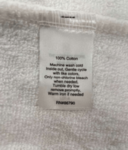 Recalled The Company Store Children's White Robes seam label