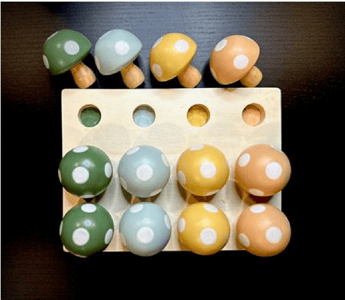 Recalled Hearth & Hand with Magnolia Toy Mushroom Peg Sorter, top view