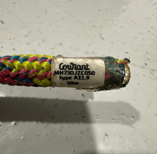 Tag on end of climbing rope (lollipop color) showing brand, part number, type and length