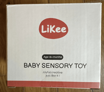 "LiKee" and "Baby Sensory Toy" are printed on the front of the teething toy packaging