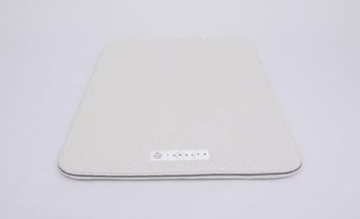 Toddler side of Recalled Modera Organic Cotton Pack N Play Mattress Dual-Sided Portable Baby Crib Pad