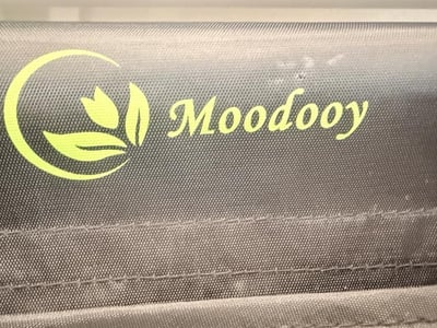 Moodooy brand name on the storage pocket