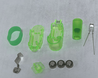 The recalled Oitnlaughter finger lights have three internal button cell batteries that power animal projections