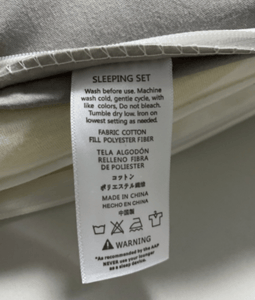 Recalled Yoocaa Baby Lounger on-product tag