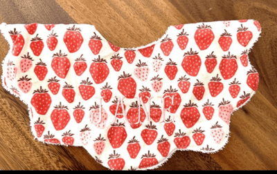 Recalled bib with strawberry print