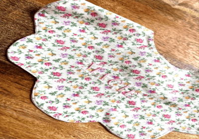 Recalled bib with floral print