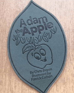 Adam the Apple, By Chris Bayon and Illustrated by Patrick Carlson are written on the leaf