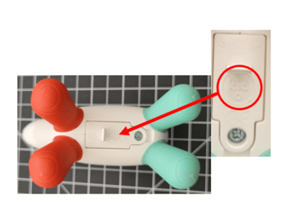Kid O printed on the battery cover of the recalled Hudson Glow Rattle