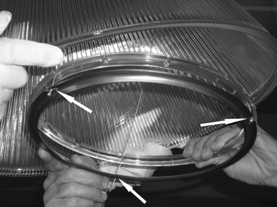Underside of the ring holding the glass diffuser.  If this piece is plastic only, it is part of the recall.