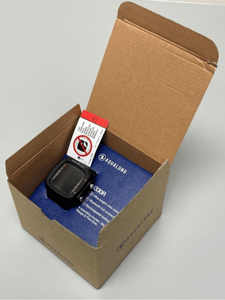 The recalled i330R dive computer in its packaging