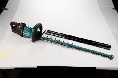 Hedge trimmer with teal guard NOT subject to recall