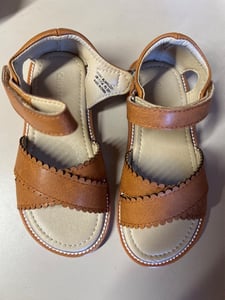 The model, batch number #LIANG2201 and the size are printed on the inside of the heel straps