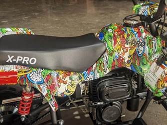 Location of X-PRO label on both sides of seat and plastic body