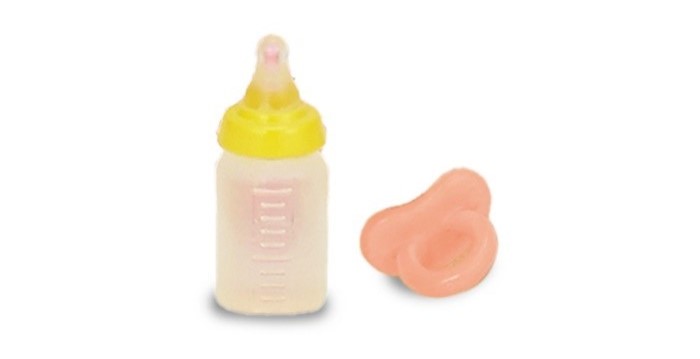 Recalled bottle in yellow and recalled pacifier in pink
